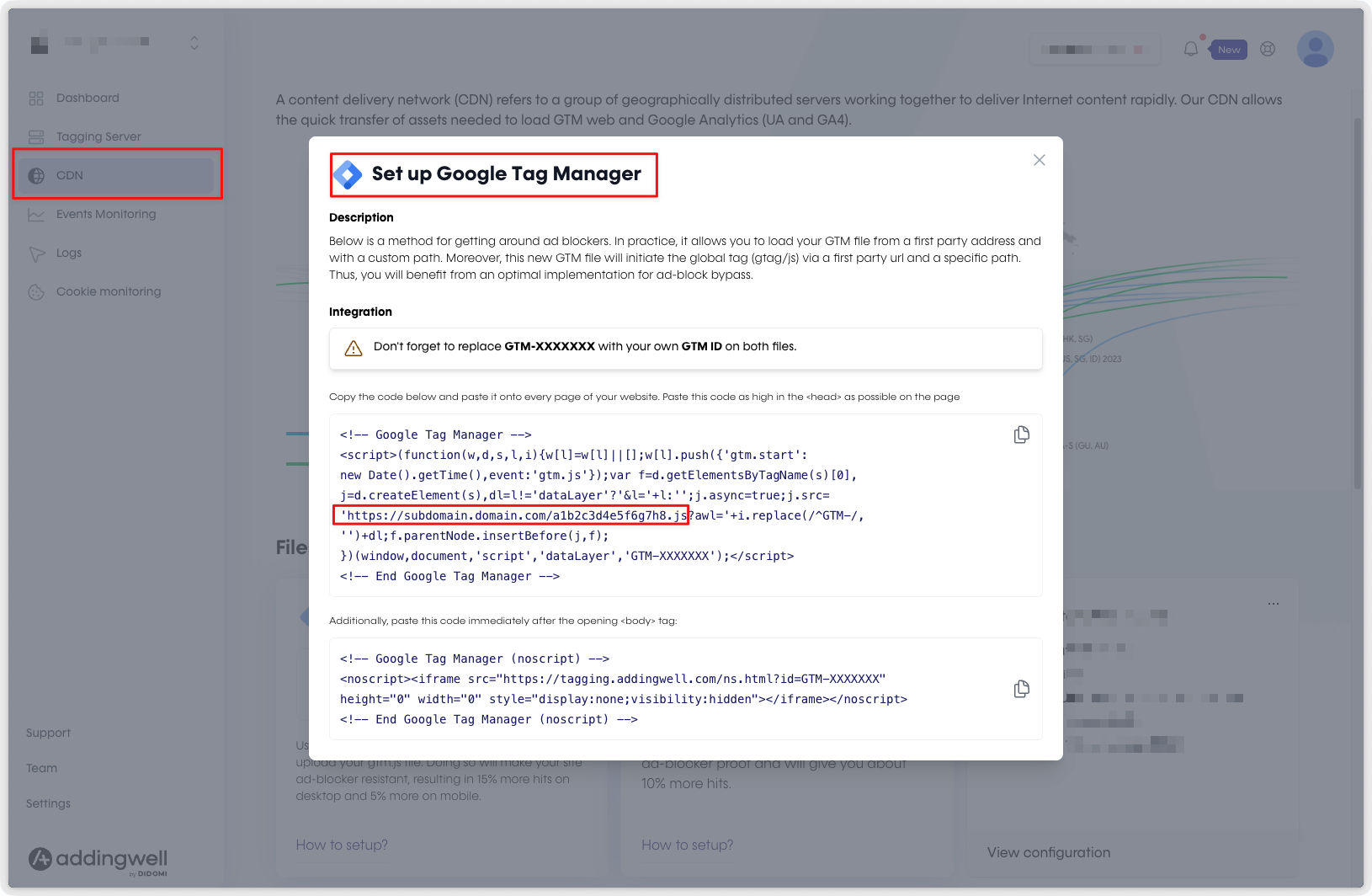 Addingwell CDN tab with the Set up Google Tag Manager window open, showing the ad-blocker bypass snippet with the first-party loader URL https://subdomain.domain.com/a1b2c3d4e5f6g7h8.js highlighted